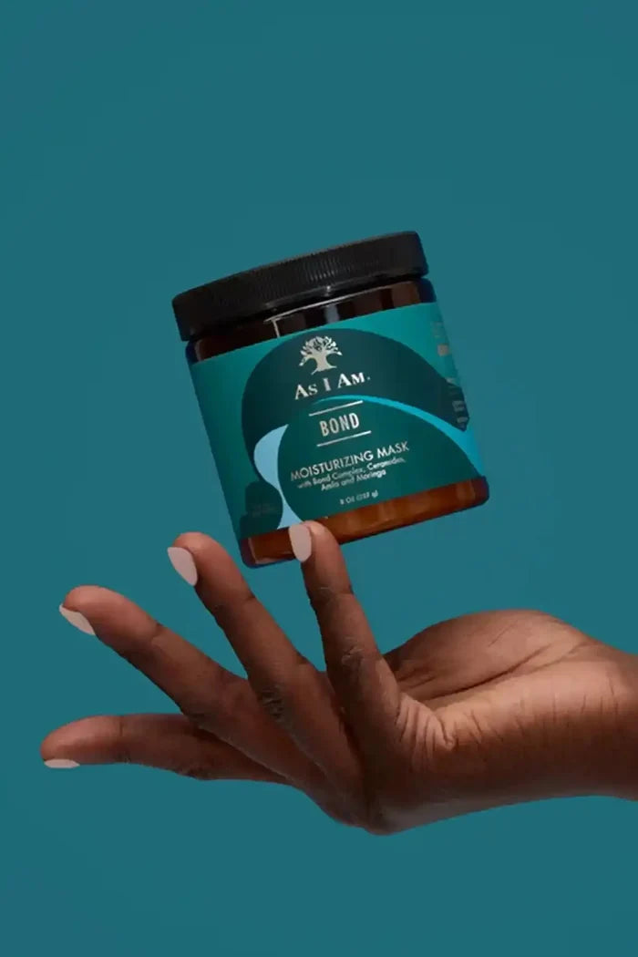 An aesthetic shot of the As I Am Bond Moisturizing Mask, providing professional-level hair repair and long-lasting moisture at home.