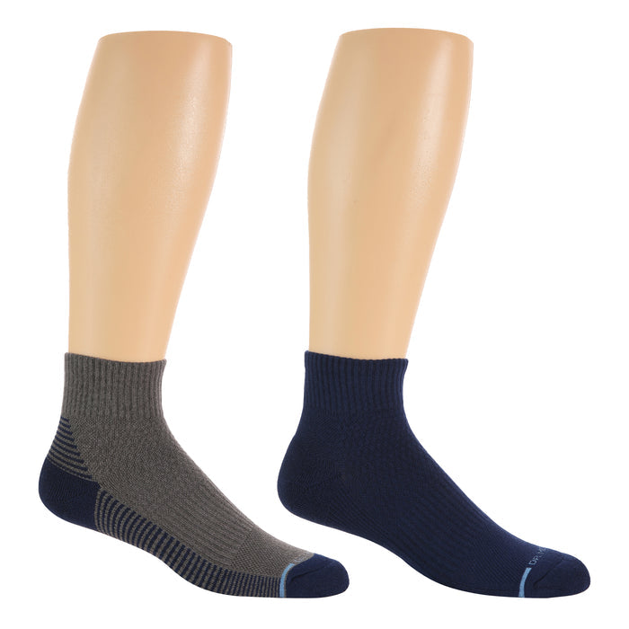 Quarter-length compression socks in gray and navy with ribbed cuffs and contrasting stripes.