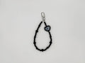Black beaded keychain wrist strap with gingham heart charm and silver swivel clip