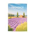 A multicolored cotton tea towel with a printed design depicting a house and lavender fields.