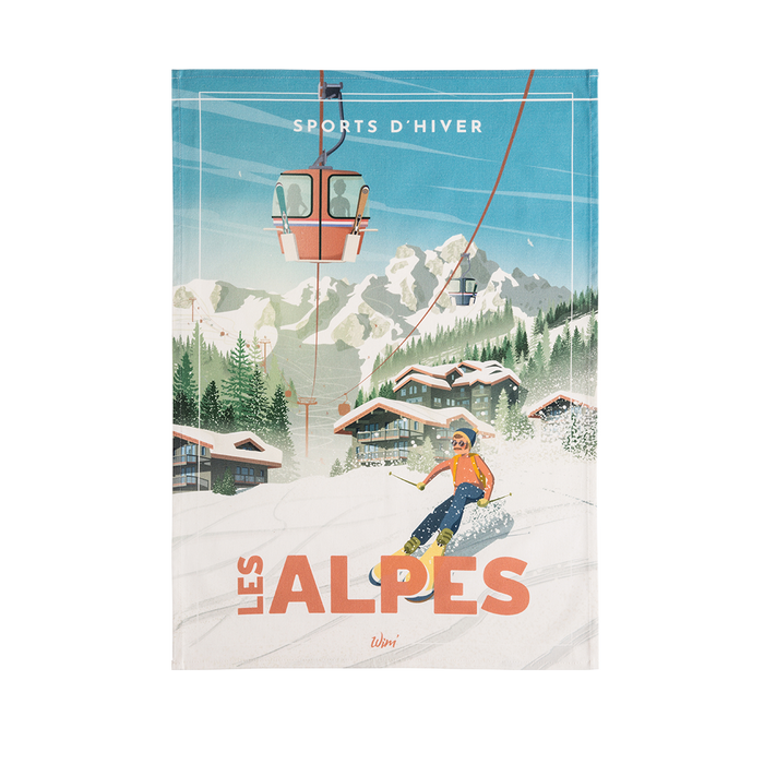 A tea towel with a printed design depicting a winter sports scene, titled 'LES ALPES' with a skier and mountains.