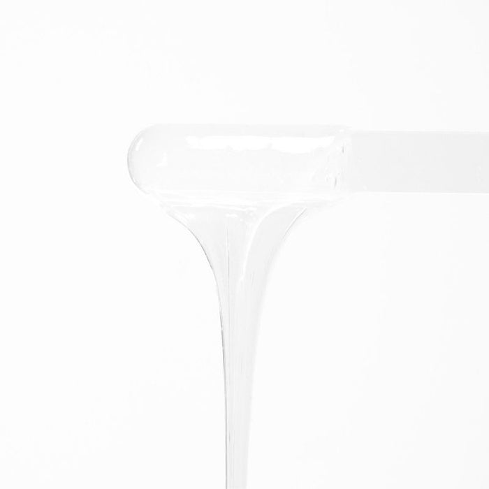 Crystal clear hard wax beads close-up — WAXBARE