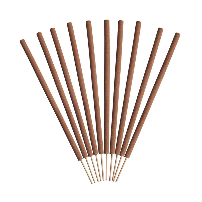 Bundle of brown agarbatti incense sticks with light-colored tips