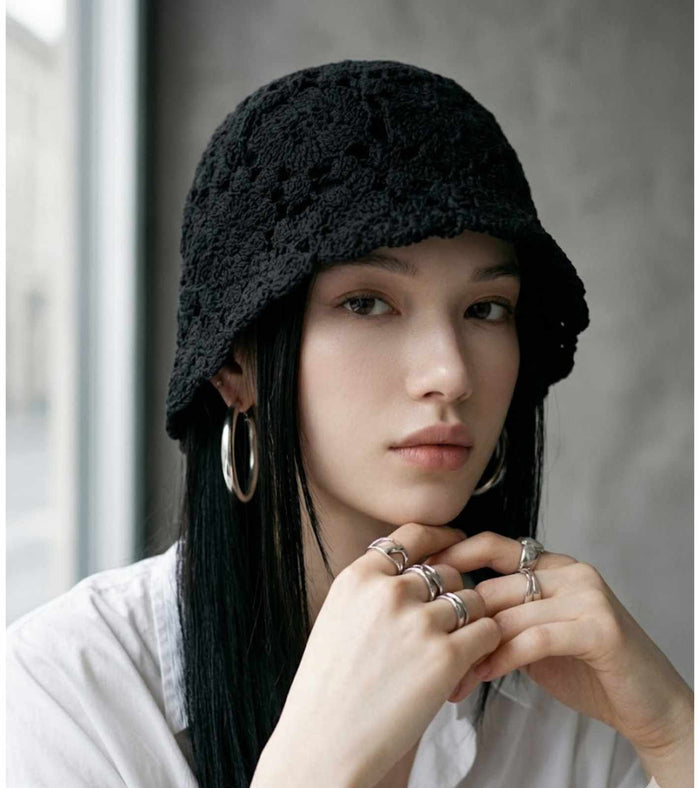 Black crochet lace bucket cap with rounded crown and scalloped brim