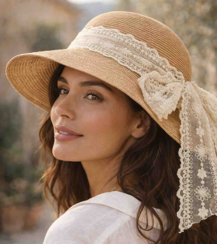 Sand straw sun hat with wide brim and lace ribbon bow on side