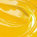 A close-up image of a lemon yellow colored liquid candle dye by Sozo Essentials.