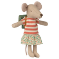 Stuffed mouse toy wearing a striped dress and wearing a green bag on a white background