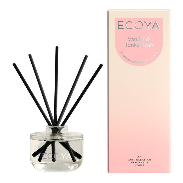 ECOYA mini reed diffuser - glass jar, next to peach & white packaging. Vanilla & tonka bean fragrance.
