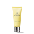 Molton Brown hand cream tube on a white background
