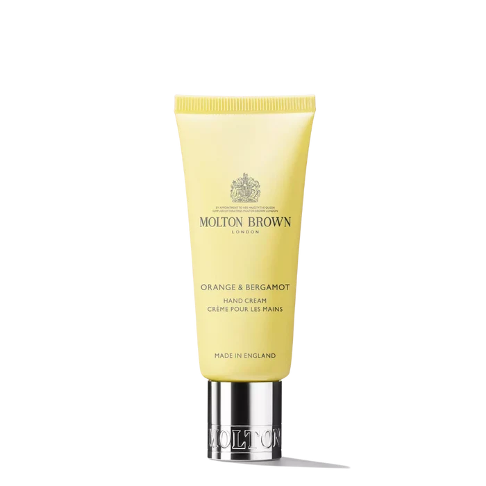 Molton Brown hand cream tube on a white background