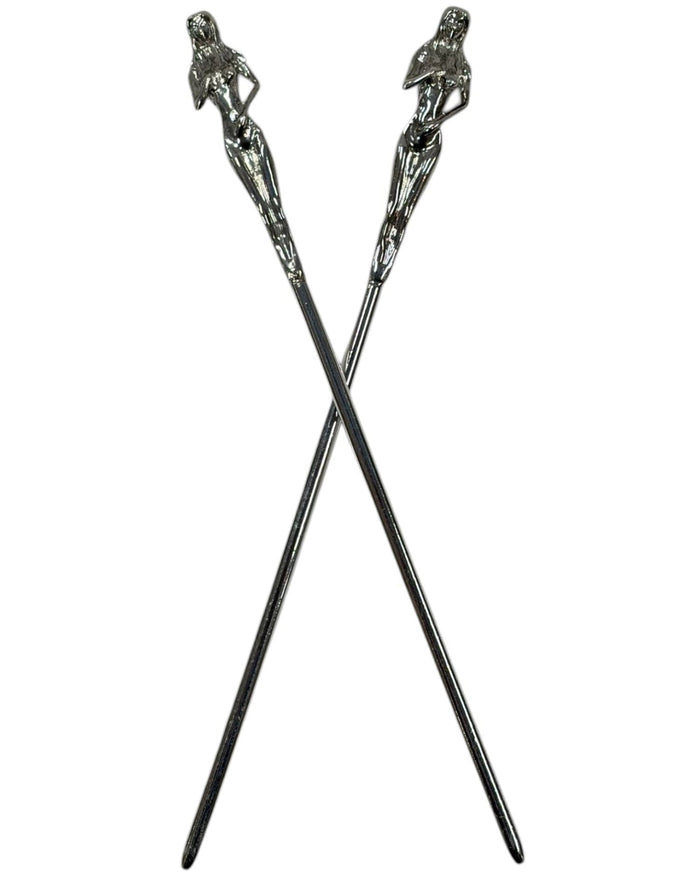 Silver Naked Lady Hair Sticks featuring sculpted female figures, decorative metal hair pins crossed on a white background.