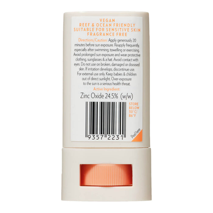 Back view of 20g tube of Natural Zinc Stick SPF 50+, a medium tint, hydrating, vegan formula that provides UVA and UVB broad spectrum protection from the sun while also being 4 hours water-resistant. The back has a peelable label showing the directions and precautions. Packaged in a cream tube with minimal orange and black text on the label.