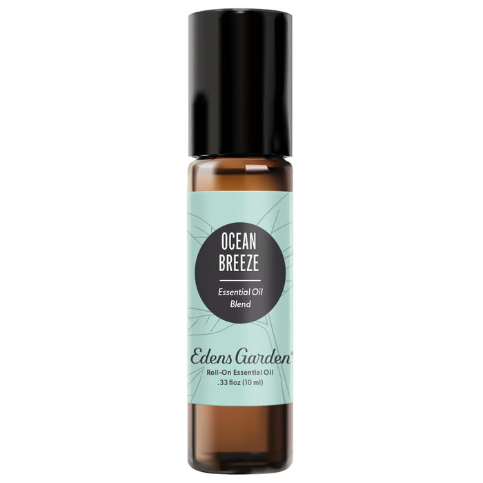 A black roll-on bottle labeled 'Ocean Breeze Essential Oil Blend' by Edens Garden.