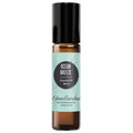 A black roll-on bottle labeled 'Ocean Breeze Essential Oil Blend' by Edens Garden.