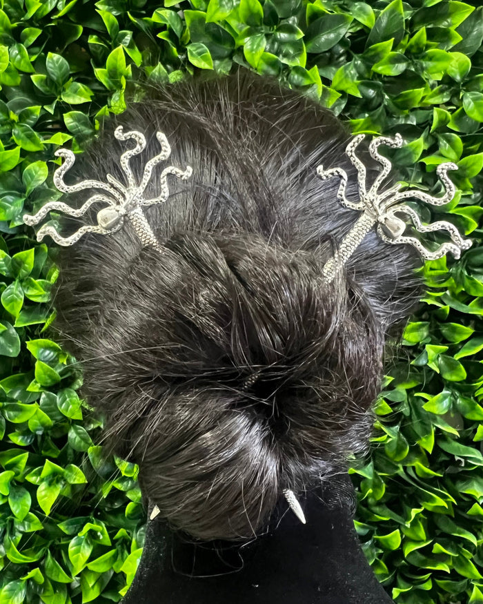 Model wearing Pirate Squid Hair Sticks – Nautical fantasy hair accessories with octopus-inspired design styled in a bun.