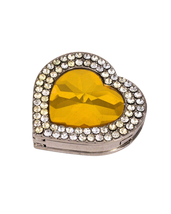 Heart-shaped rhinestone purse holder hook with yellow gemstone center, silver-toned frame