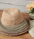 Layered crochet sun hat with wide brim, beige and taupe neutral tones