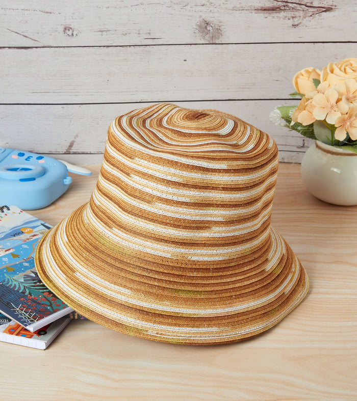 Striped summer sun hat in beige and rust tones with wide brim
