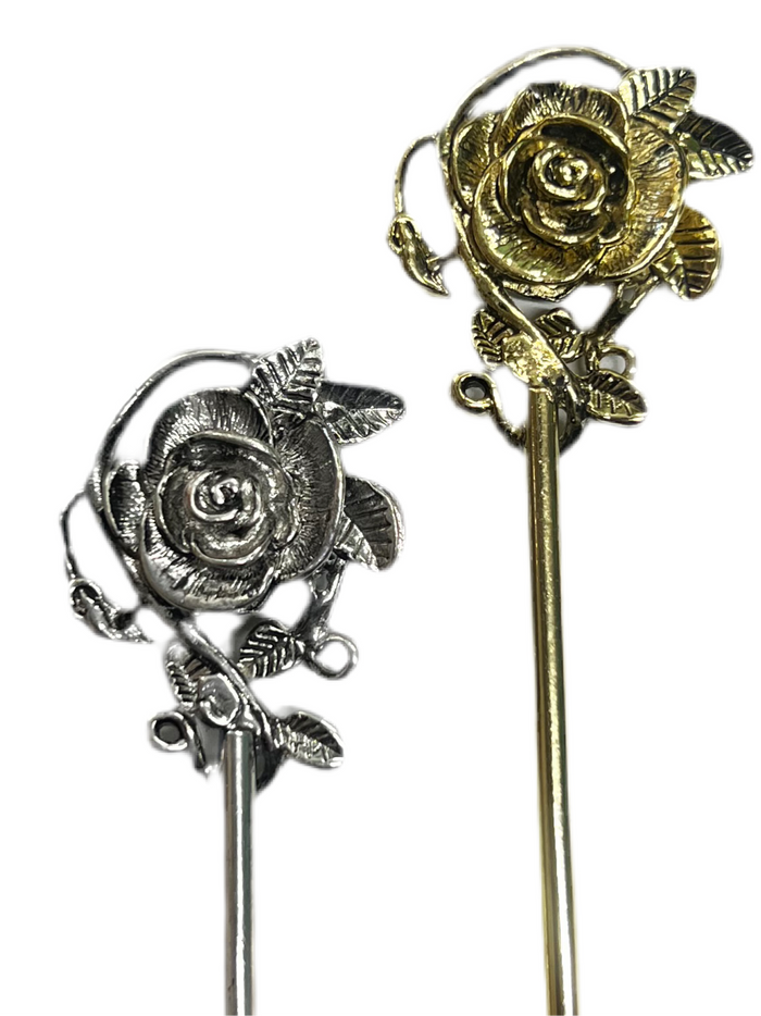 Silver and gold rose hair sticks shown side by side with elegant floral vine design decorative hair pins on a white background.