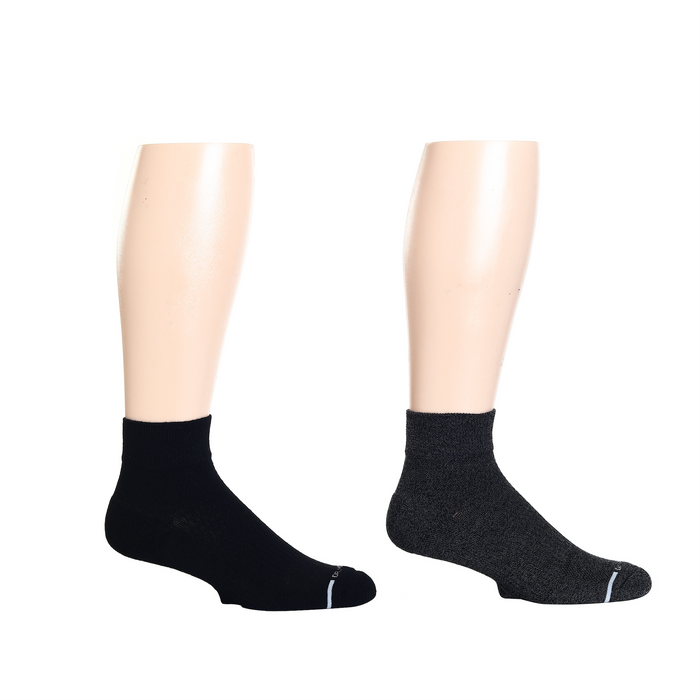 Black and dark gray quarter compression socks displayed on mannequin legs.