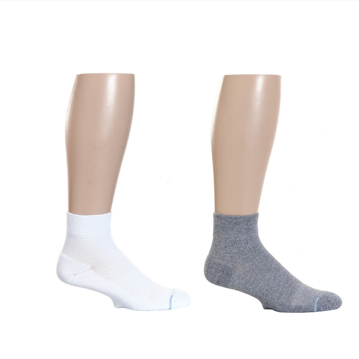 White and gray quarter compression socks displayed on mannequin legs.