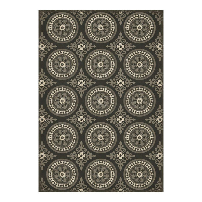 Decorative floor mat with circular pattern on a white background