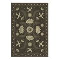 Decorative rug with floral and bird pattern on a dark background