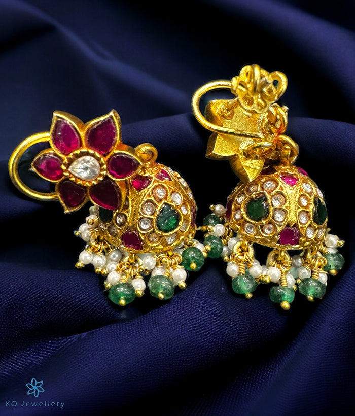 Aadyasha Silver Kundan Jhumkas with floral design and pearl drops.
