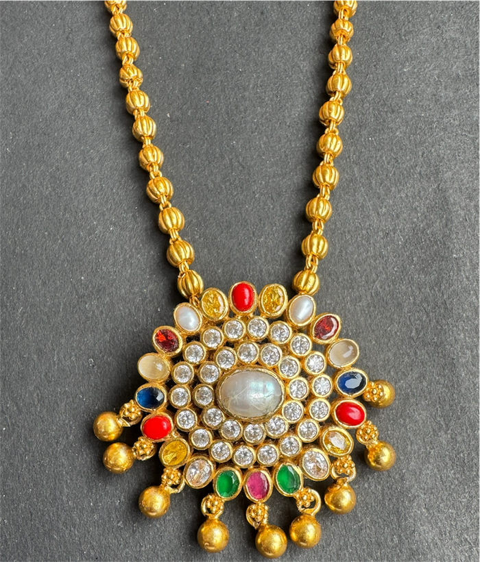 The Yajata Silver Navratna Pendant & Earrings