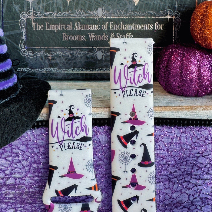 Witch Please Fitbit Versa 1/2 band shown as two strap halves standing upright beside a magenta glitter pumpkin.