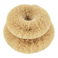 2 plastic free, coconut fibre scourers stacked on top of each other.