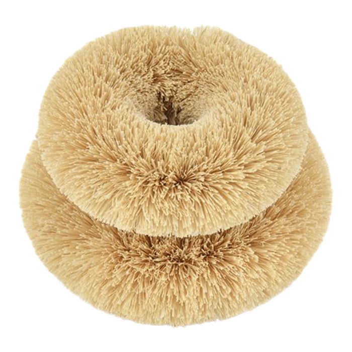 2 plastic free, coconut fibre scourers stacked on top of each other.